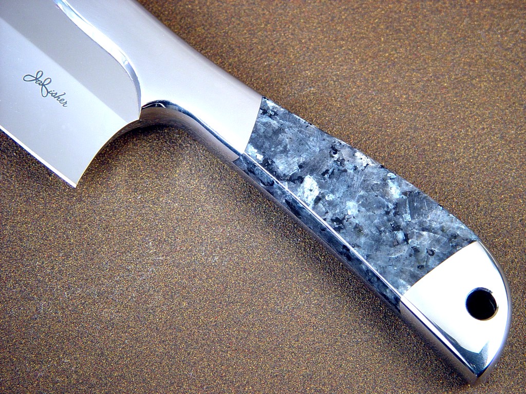 "Vega" Master Chef's Knife obverse side view: 440c high chromium stainless steel blade, 304 stainless steel bolsters, Larvikite (Blue Pearl granite) gemstone handle, kydex, nickel plated steel slip sheath