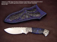 Fine handmade custom knife: "Chama" in 440C stainless steel blade, hand-engraved carbon steel bolsters, Sodalite gemstone handle, ostrich skin inlaid in hand-carved leather sheath