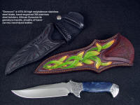 "Domovoi", obverse side view in ATS-34 high molybdenum stainless steel blade, hand-engraved 304 stainless steeel bolsters, African dumortierite gemstone handle, hand-carved, tooled, hand-dyed leather sheath