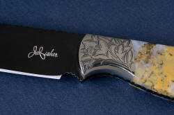 "Aquila" obverse side front bolster engraving detail. All components of this knife flow seamlessly together. 