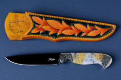 "Aquila" obverse side view without white reflector in mirror polished and hot blued O1 high carbon tungsten-vandium tool steel blade, hand-engraved 304 stainless steel bolsters, Golden Plume Agate gemstone handle, hand-carved, hand-dyed leather sheath