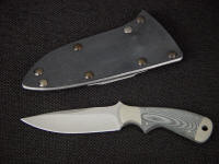 "Creature" CSAR, tactical knife, obverse side view in bead blasted 440C stainless steel blade, nickel silver bolsters, canvas micarta handle, kydex, aluminum, blued steel sheath