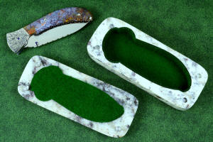 "Starling" granite with garnets and hornblende stone sarcophagus case with cabochons of Rio Grande Agate gemstone and stainless steel pins, polyester felt lining "Starling" granite with garnets and hornblende stone sarcophagus case with cabochons of Rio Grande Agate gemstone and stainless steel pins, polyester felt lining