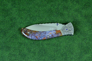 "Starling" fine handmade custom folding knife, obverse side view in high molybdenum stainless steel blade, engraved stainless bolsters, faceted amethyst gemstone accents and Rio Grande Agate handle "Starling" fine handmade custom folding knife, obverse side view in high molybdenum stainless steel blade, engraved stainless bolsters, faceted amethyst gemstone accents and Rio Grande Agate handle