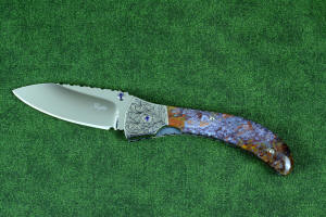 "Starling" fine handmade custom folding knife, obverse side view in high molybdenum stainless steel blade, engraved stainless bolsters, faceted amethyst gemstone accents and Rio Grande Agate handle "Starling" fine handmade custom folding knife, obverse side view in high molybdenum stainless steel blade, engraved stainless bolsters, faceted amethyst gemstone accents and Rio Grande Agate handle