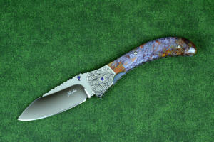 "Starling" fine handmade custom folding knife, obverse side view in high molybdenum stainless steel blade, engraved stainless bolsters, faceted amethyst gemstone accents and Rio Grande Agate handle "Starling" fine handmade custom folding knife, obverse side view in high molybdenum stainless steel blade, engraved stainless bolsters, faceted amethyst gemstone accents and Rio Grande Agate handle