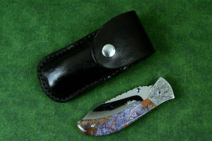 "Starling" fine handmade custom folding knife with black patent leather pocket sheath in 5-6 oz. shoulder, nylon, stainless steel "Starling" fine handmade custom folding knife with black patent leather pocket sheath in 5-6 oz. shoulder, nylon, stainless steel