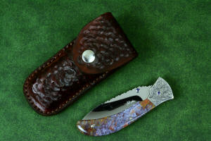 "Starling" fine handmade custom folding knife with brown camouflage leather pocket sheath in 5-6 oz. shoulder, nylon, stainless steel "Starling" fine handmade custom folding knife with brown camouflage leather pocket sheath in 5-6 oz. shoulder, nylon, stainless steel