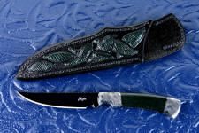 "Wasat" obverse side view in O1 high carbon tungsten vanadium tool steel alloy steel, hand-engraved 304 stainless steel bolsters, Australian Black Jade gemstone handle, hand-carved leather sheath inlaid with green lizard skin