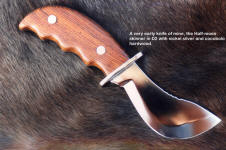 This Half Moon Caping knife is a very early knife of mine, in hollow ground D2 and Cocobolo hardwood, a tough skinner