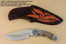 "Orion" obverse side view in 440C high chromium stainless steel blade, hand-engraved 304 stainless steel bolsters, Rio Grande Agate gemstone  handle, hand-carved leather sheath inlaid with frog skin