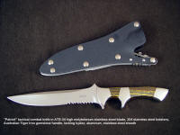 "Patriot" Tactical knife, obverse side view: ATS-34 high molybdenum stainless steel blade, 304 stainless steel bolsters, Australian Tiger Iron gemstone handle, locking kydex, aluminum, stainless steel sheath