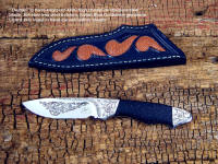 "Thuban" investment grade collector's knife in hand-engraved 440C stainless steel blade, 304 stainless steel bolsters, Italian Blue Goldstone handle, lizard skin inlaid in leather sheath